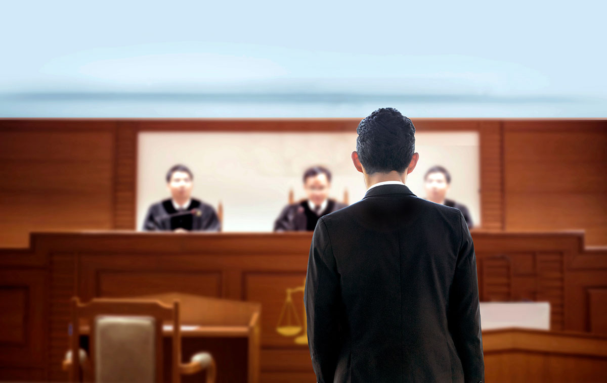 attorney representing client in courtroom